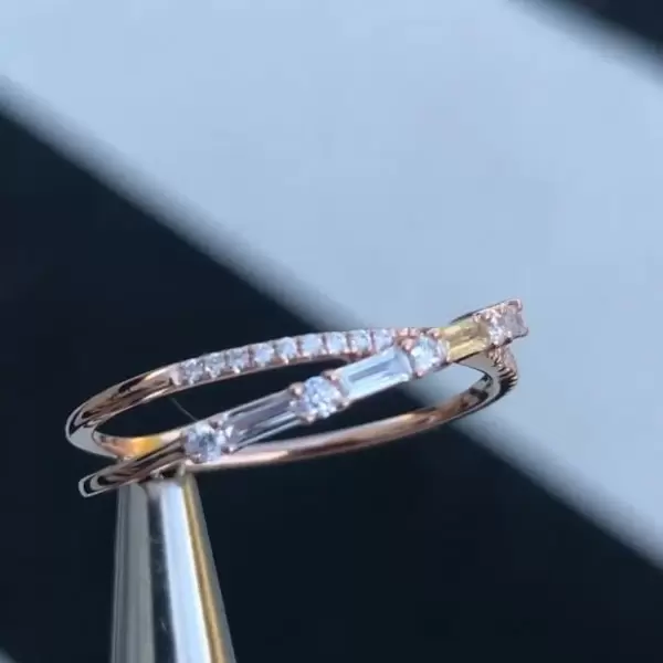 Fashion Criss Cross Baguette & Round Diamond Anniversary Band in Rose Gold Tone
