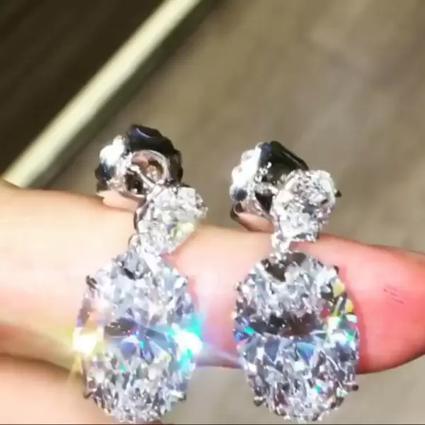 Oval Cut White Sapphire Drop Earrings