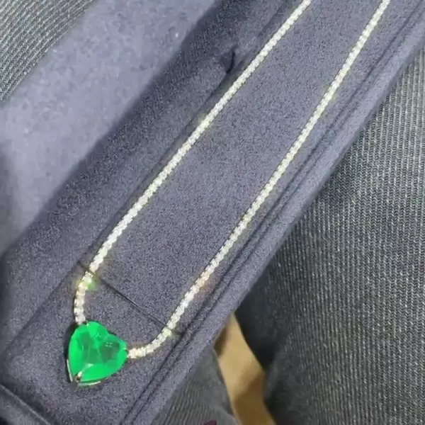 White Sapphire Tennis Necklace with Heart Emerald Pendant