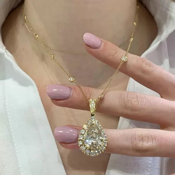 9.3ct Pear Cut White Sapphire Halo Pendant Necklace