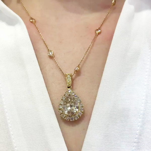 9.3ct Pear Cut White Sapphire Halo Pendant Necklace