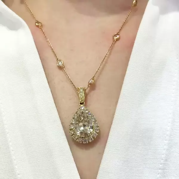 9.3ct Pear Cut White Sapphire Halo Pendant Necklace