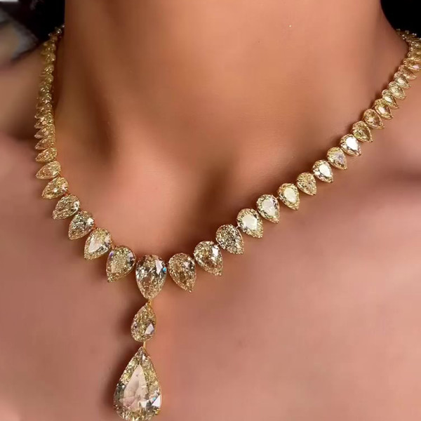 60ctw Pear Cut Yellow Sapphire Pendant Necklace in Gold