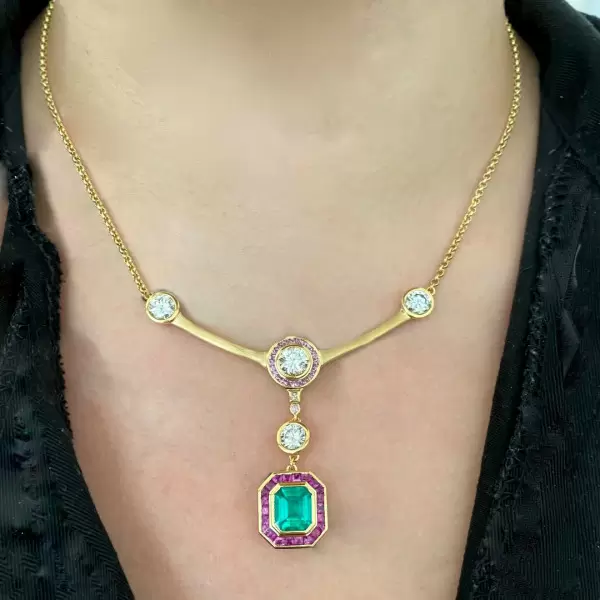 4ct Emerald Cut Emerald With Ruby Halo Pendant Necklace