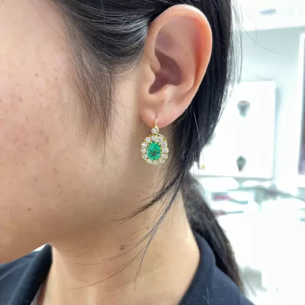 Vintage Style Oval Cut Emerald Drop Earrings in Gold