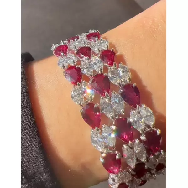 36ctw White Sapphire and Three Row Ruby Bracelet