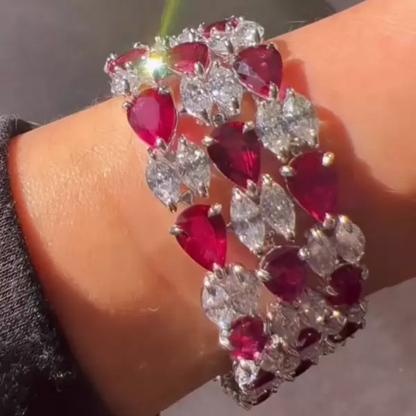 36ctw White Sapphire and Three Row Ruby Bracelet