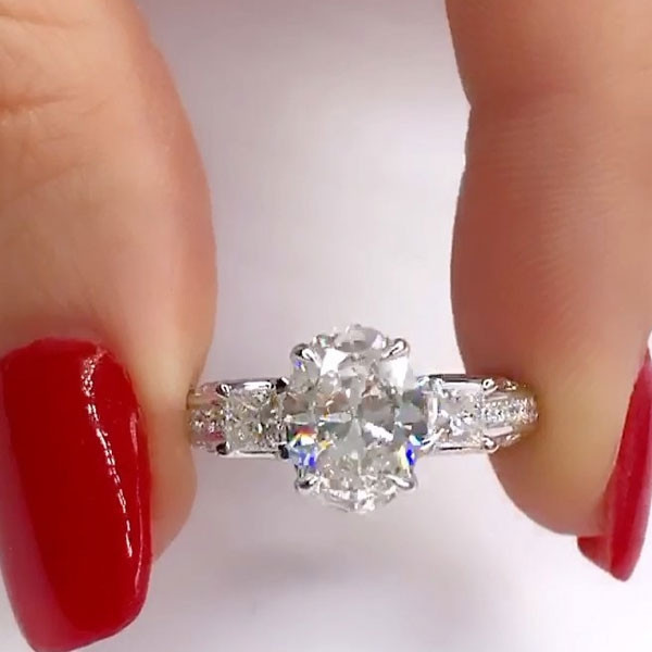 3.15ct Oval Cut Engagement Ring with Two Princess Sidestones
