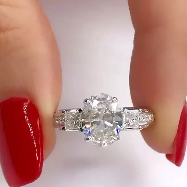 3.15ct Oval Cut Engagement Ring with Two Princess Sidestones