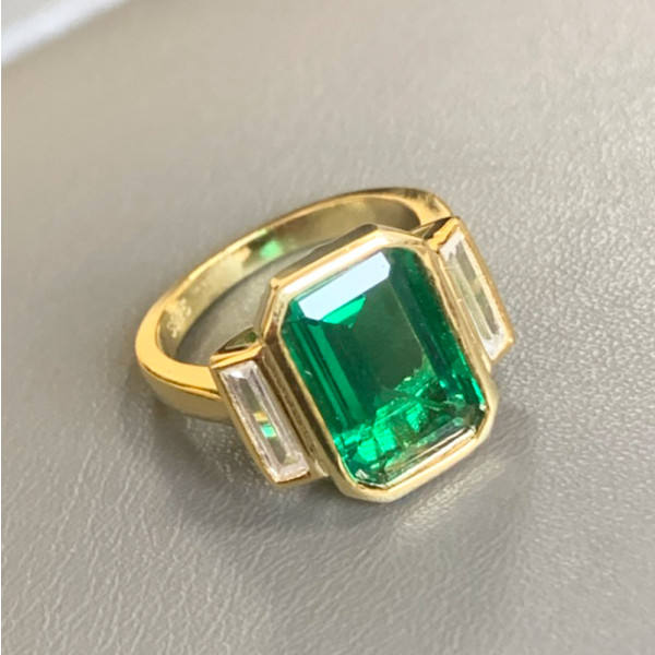 5ct Emerald Cut Bezel Set Engagement Ring