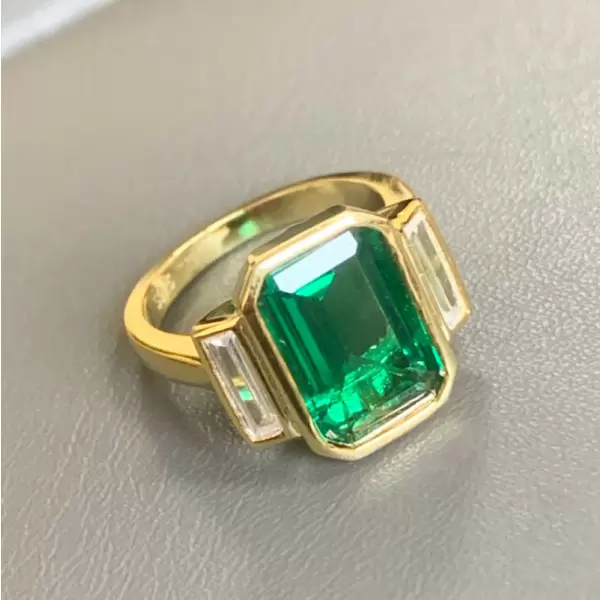 5ct Emerald Cut Bezel Set Engagement Ring