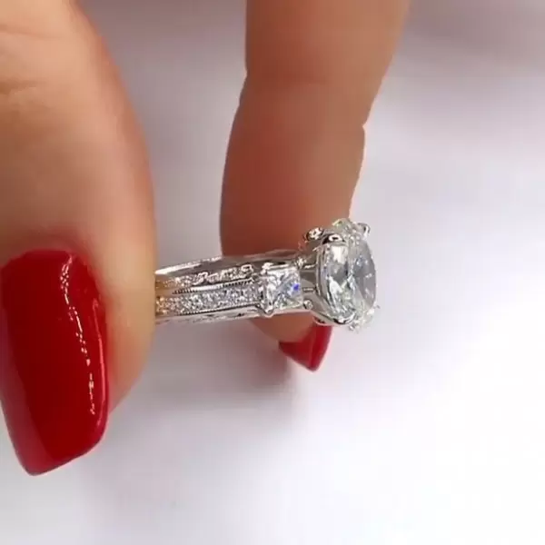 3.15ct Oval Cut Engagement Ring with Two Princess Sidestones