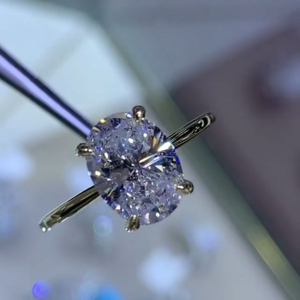 2.5ct Oval Cut White Sapphire Engagement Ring in Gold