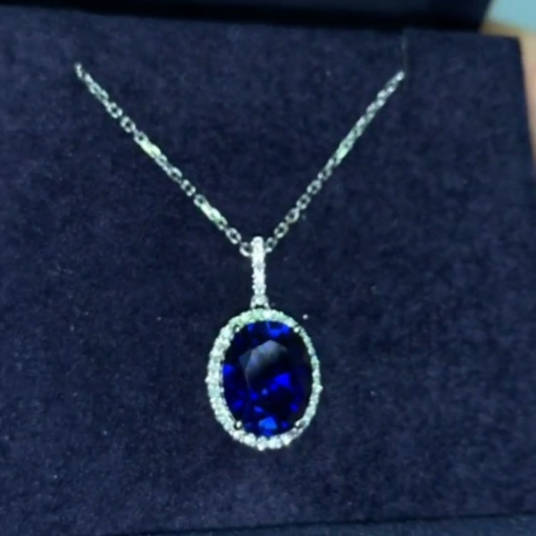 Halo Oval Cut Blue Sapphire Pendant Necklace