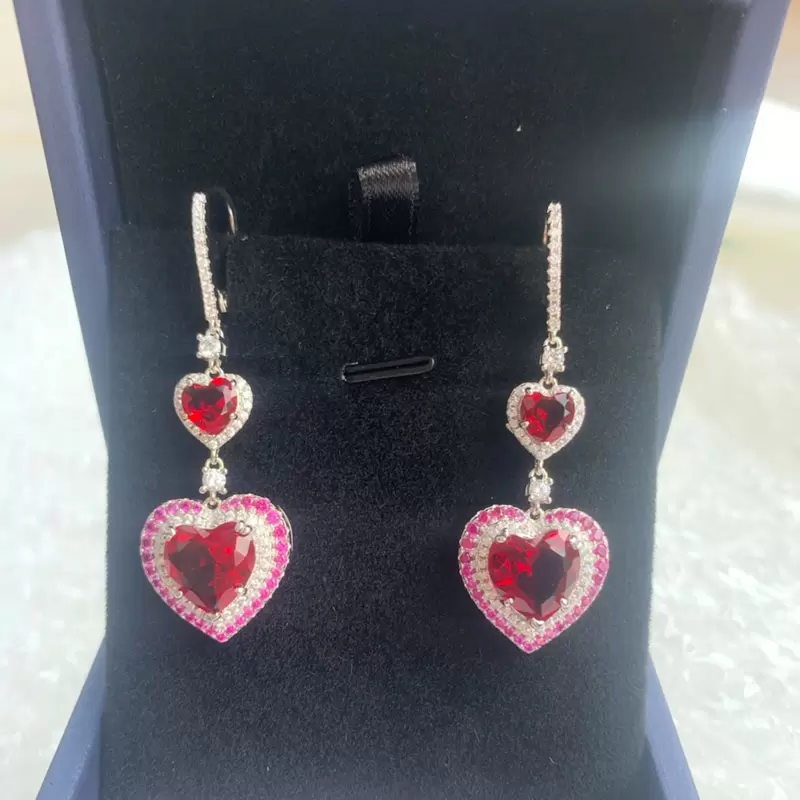 Lever back earrings with red stone in center